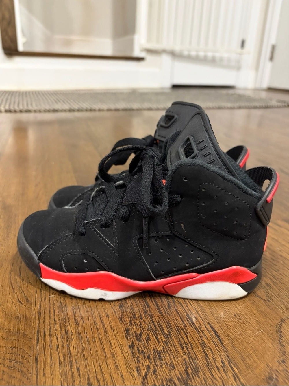 Jordan Kids Black and Red High-Top Sneakers